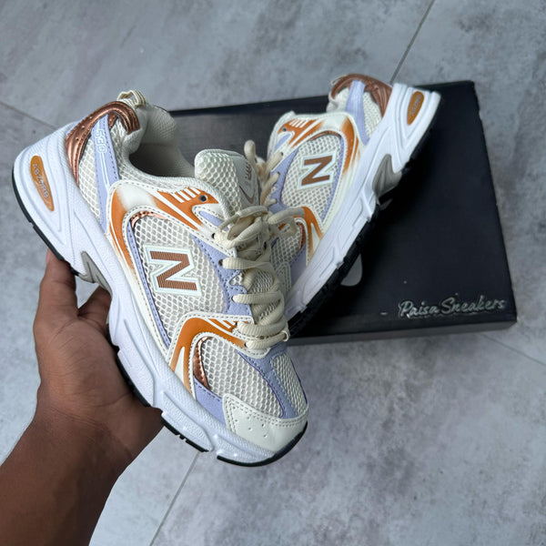 NB 530 Lila Beige